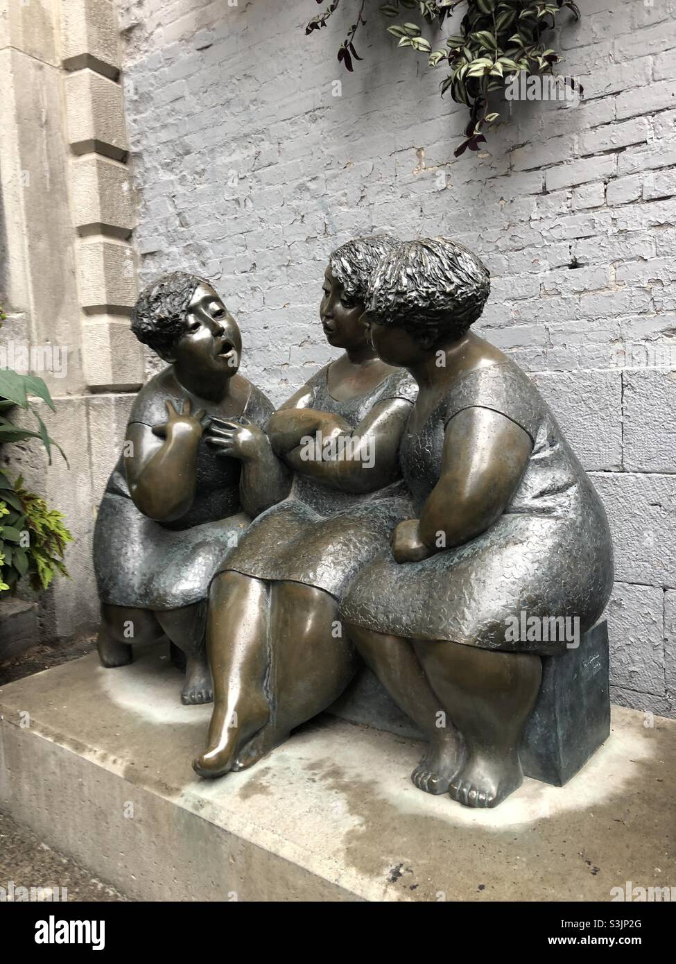A bronze sculpture of three women in Old Town, Montreal, Quebec