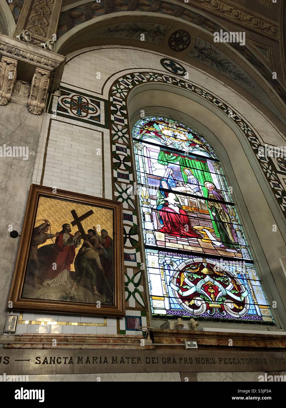 Stain glass window in a Catholic Church in Montreal, Quebec, Canada. - Smartphone Captured Stock Image