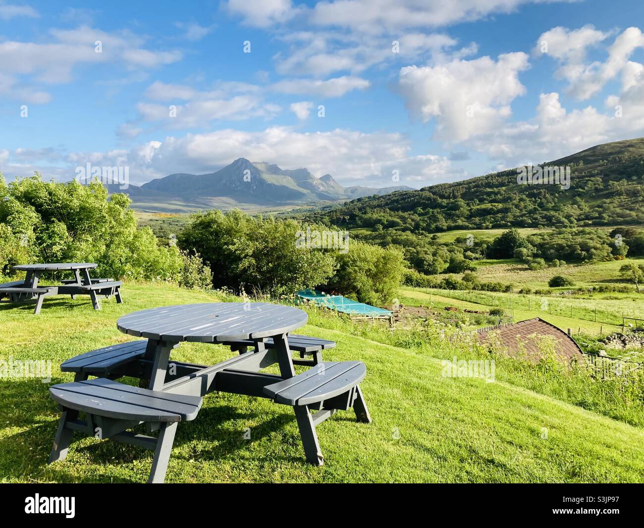 Picnic table with a view of Ben Loyal in the background. Tongue, Scotland. North Coast 500. - Smartphone Captured Stock Image