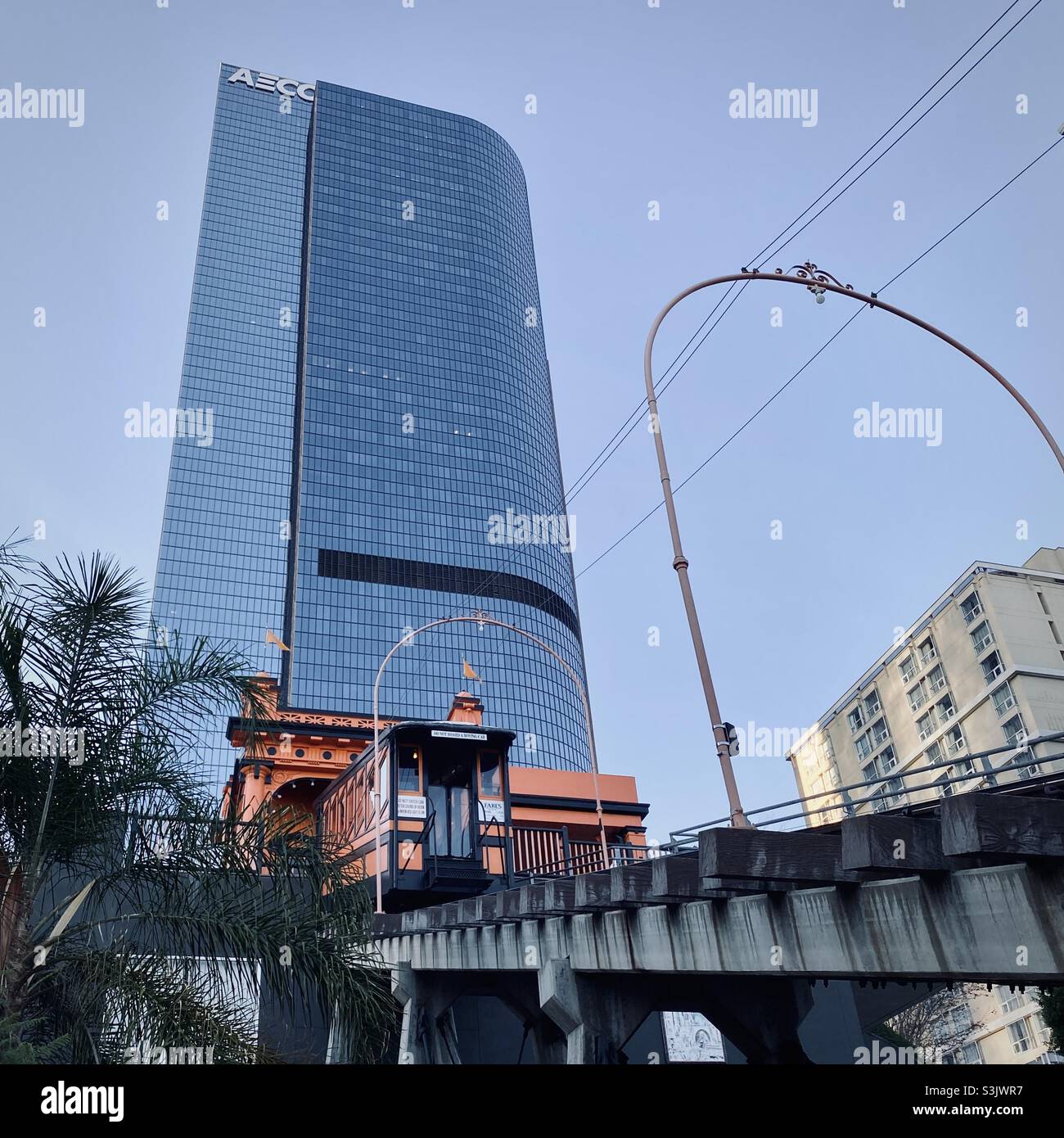 LOS ANGELES, CA, JAN 2021: skyscraper at California Plaza looms over orange cars and station of Angels' Flight funicular railway on Bunker Hill, in the financial district of Downtown - Smartphone Captured Stock Image