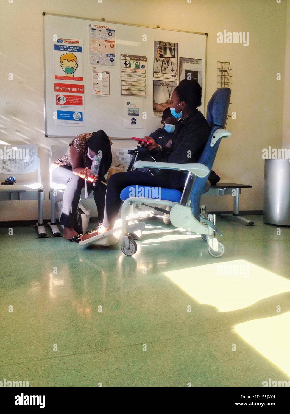 Waiting in a hospital emergency room - Smartphone Captured Stock Image