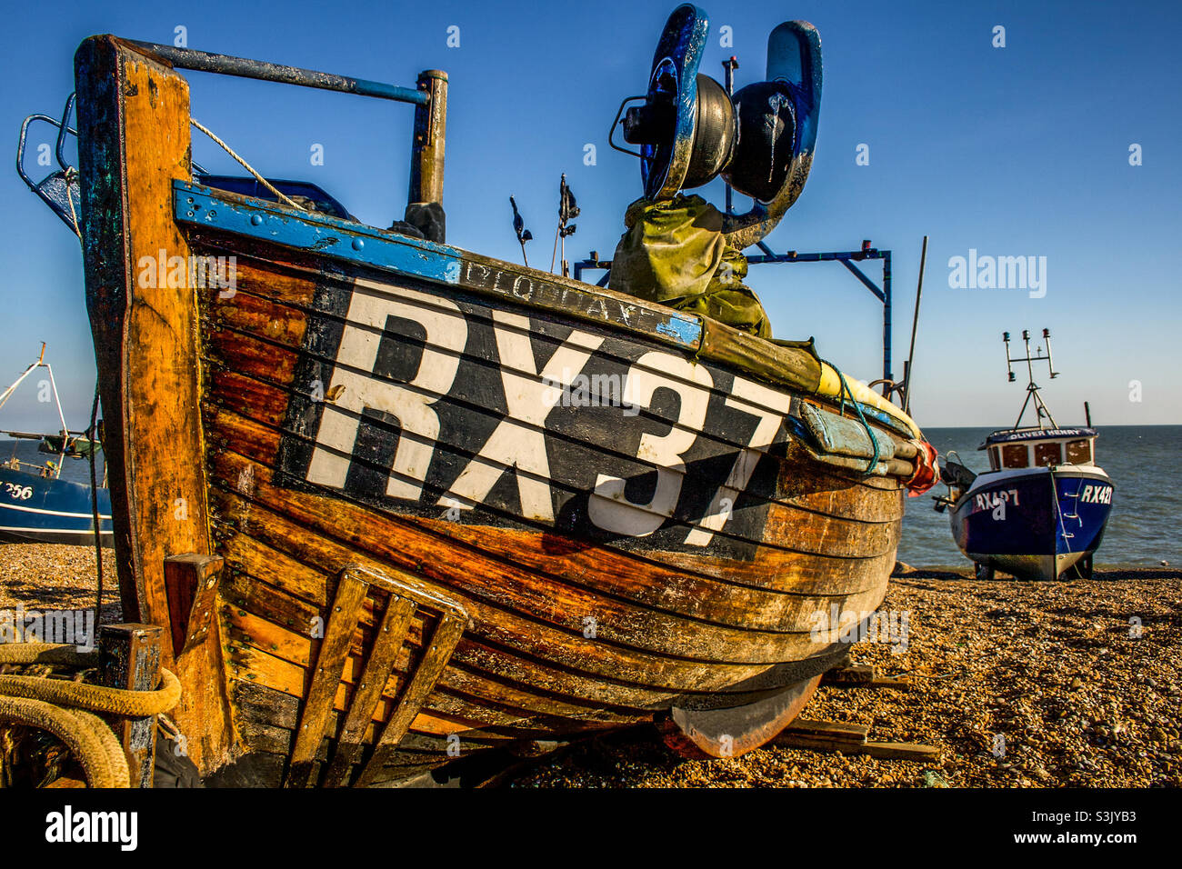 2 Fishing vessels on the working fishing beach of Hastings, UK - Smartphone Captured Stock Image