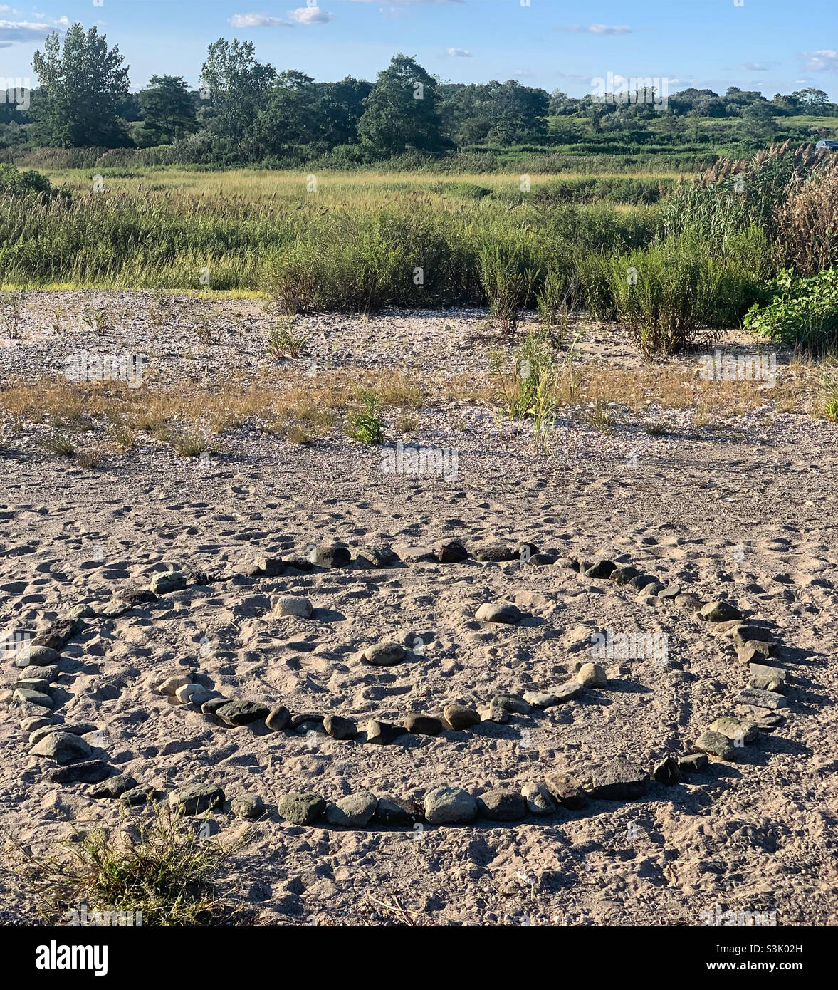 A smiley face made of rocks, Silver Sands State Park, Milford, New Haven County, Connecticut, United States - Smartphone Captured Stock Image