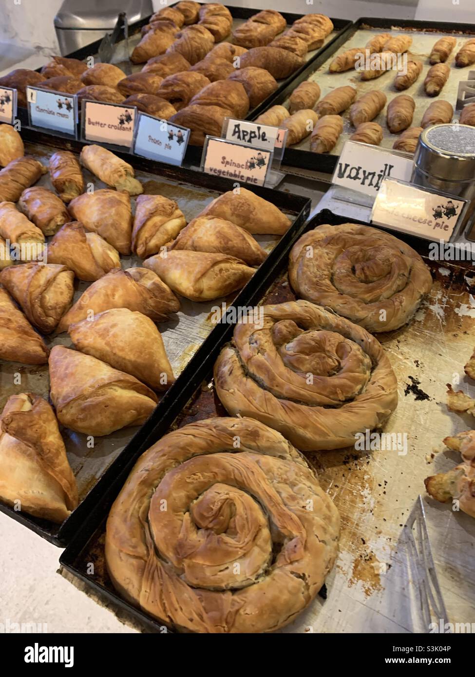 Burek pastry at the medieval bakery in Mykonos Greece - Smartphone Captured Stock Image