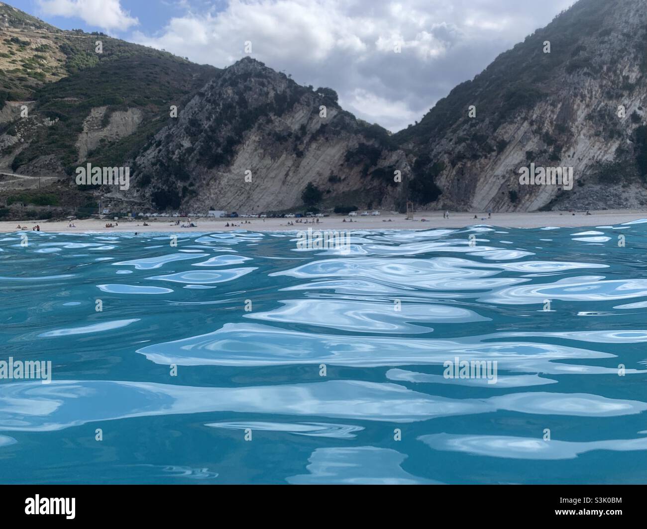 View of Myrtos beach from the water - Smartphone Captured Stock Image