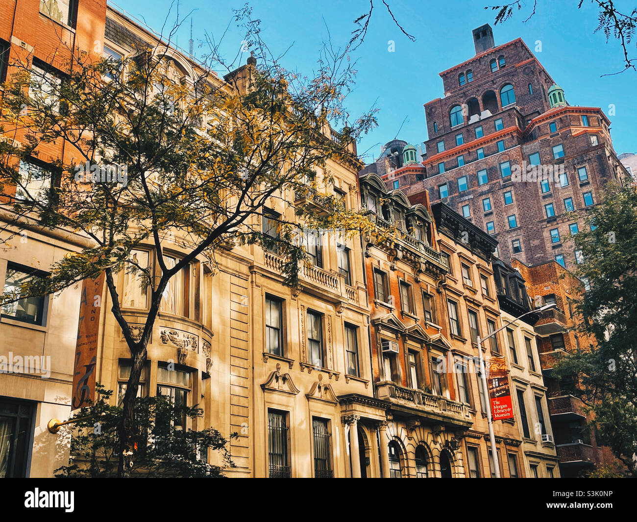 Brownstones line E. 38th St. in Murray Hill, and Neighbourhood Inn Midtown Manhattan, NYC, USA, 2021 - Smartphone Captured Stock Image