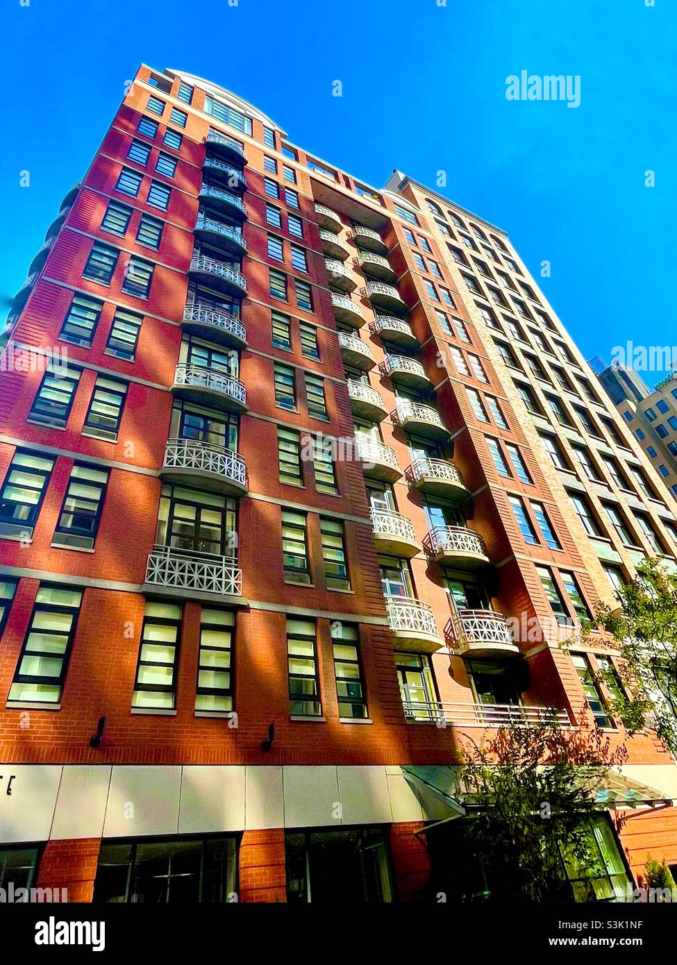 Giraffe hotel in New York City on a clear day - Smartphone Captured Stock Image