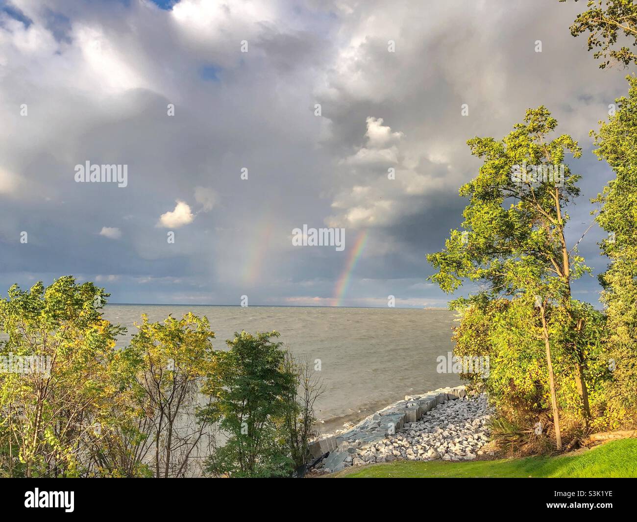 Double rainbow over Lake Ontario, Canada. - Smartphone Captured Stock Image