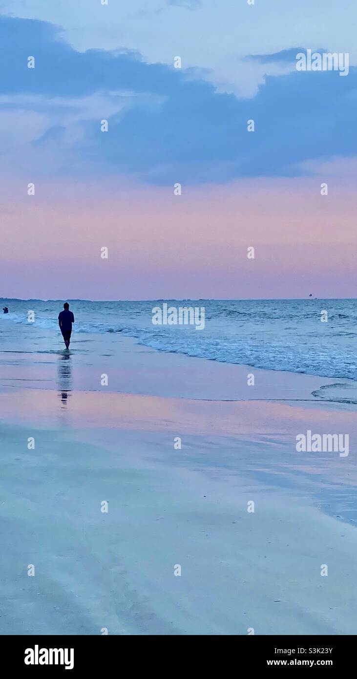 Alone at the beach Stock Photo - Alamy