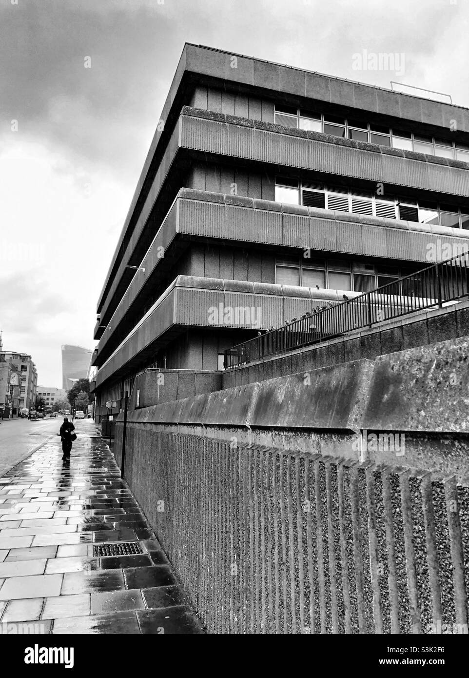 Brutalist architecture. Baynard House multi-storey car park in Queen Victoria Street on a wet, rainy day, London, England. - Smartphone Captured Stock Image