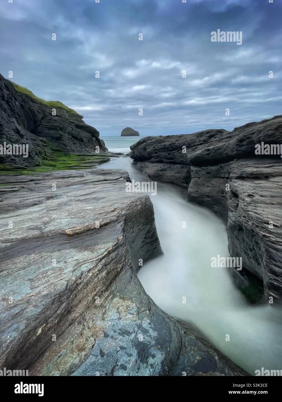 Trebarwith stream flowing down to Trebarwith Strand, North Cornwall, England, October. - Smartphone Captured Stock Image