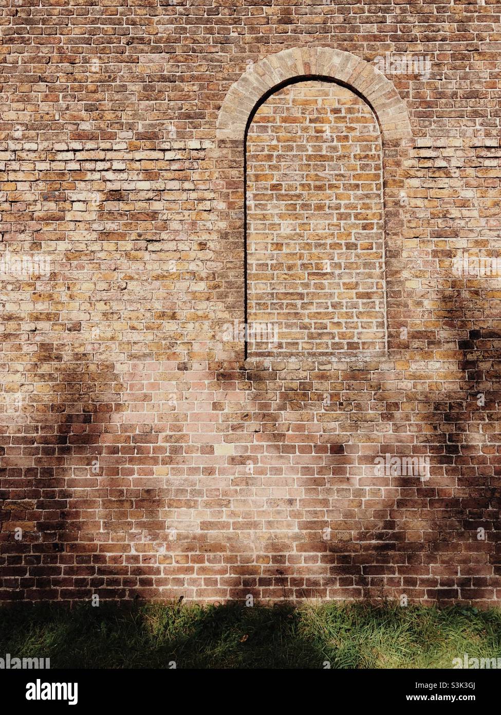 Brick wall with a window shape outside - Smartphone Captured Stock Image
