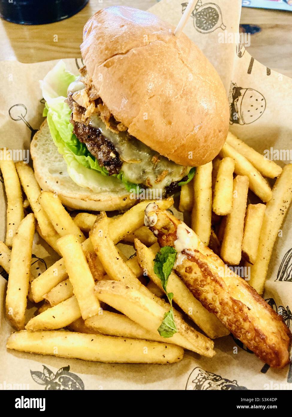Cheese burger with skinny chips at Giraffe restaurant Birmingham, U.K