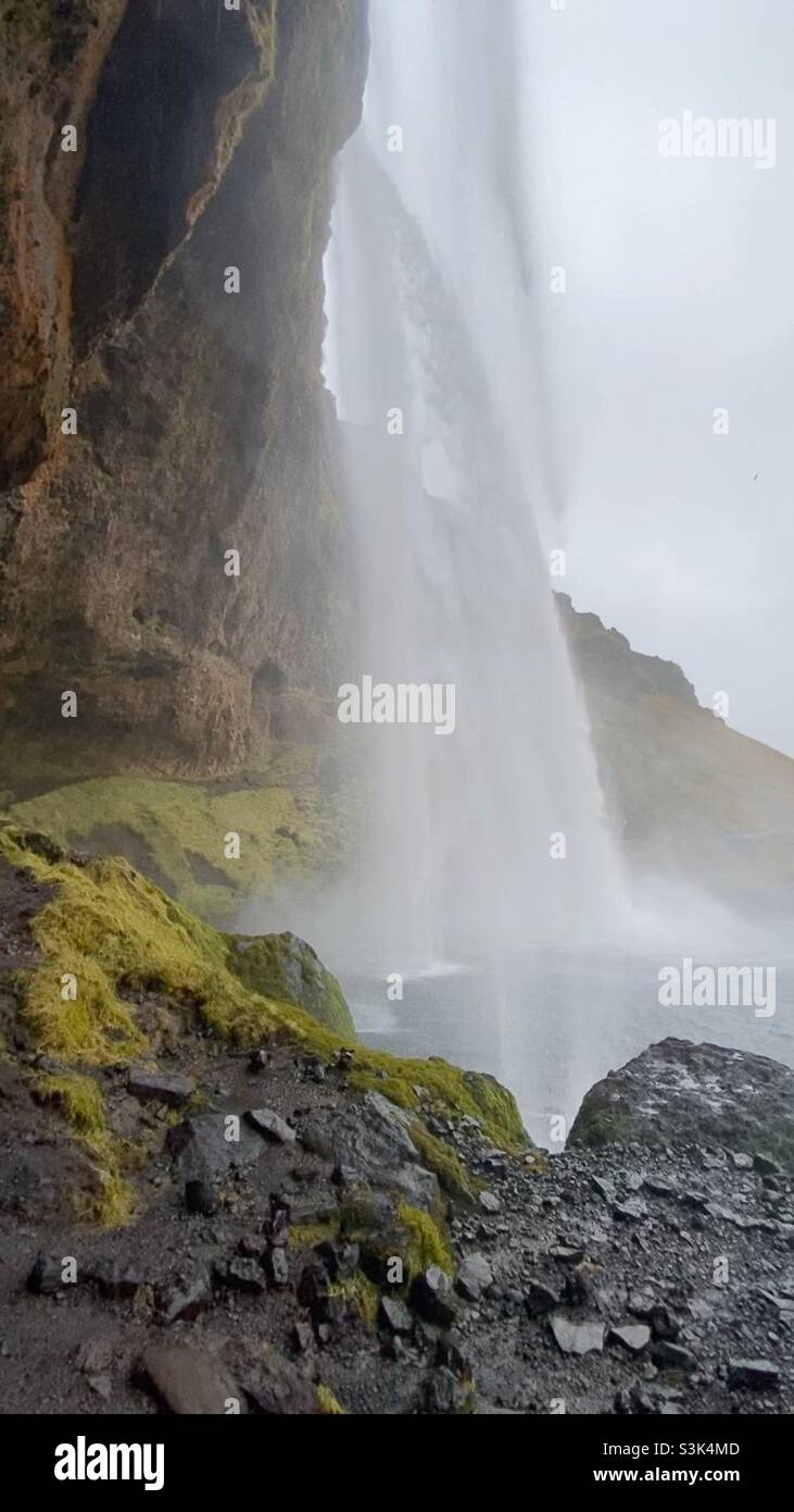 Behind Skogafoss waterfall in Iceland October 2021 Stock Photo