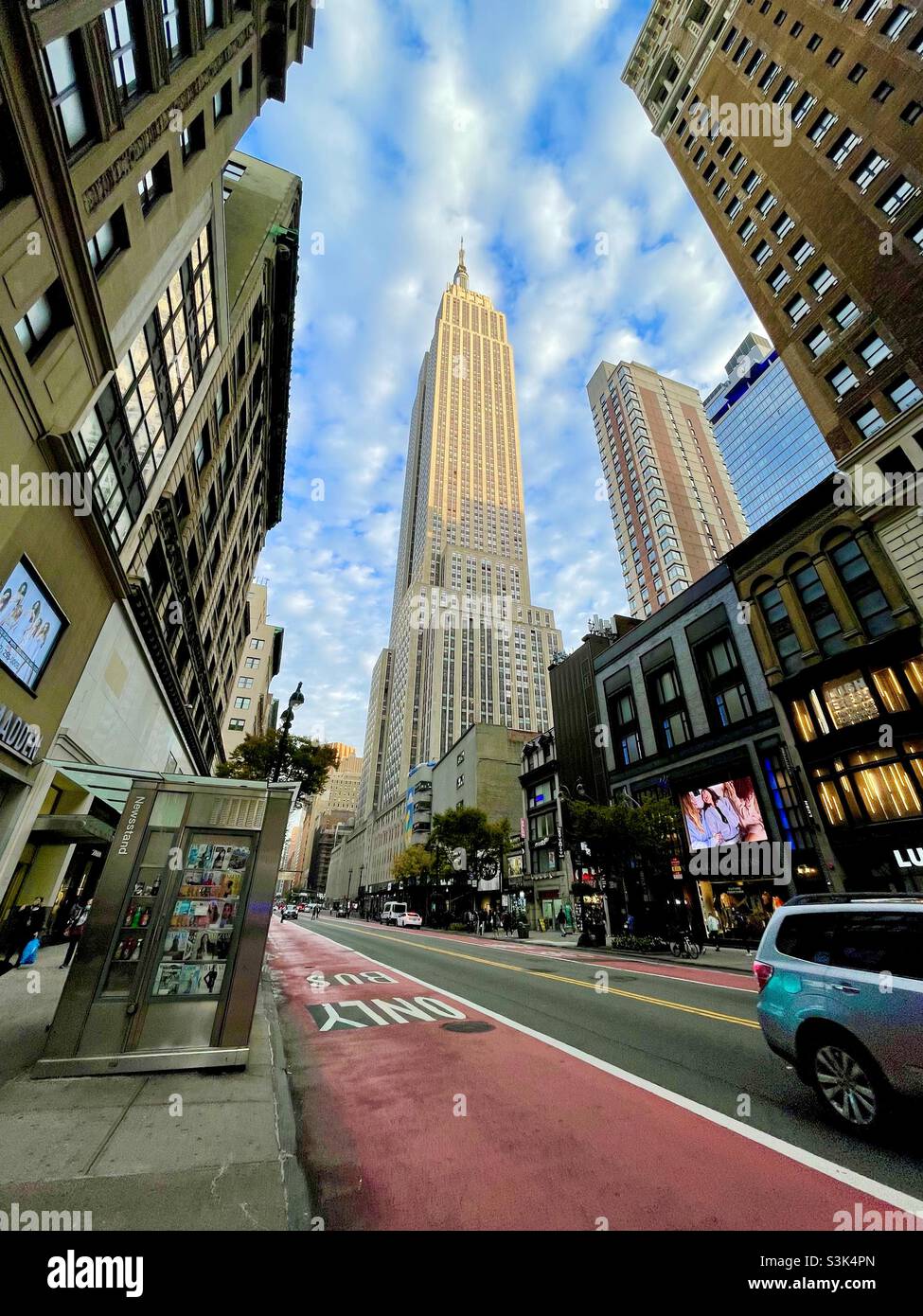 Looking up at the Empire State building from 34th St. in New York City - Smartphone Captured Stock Image