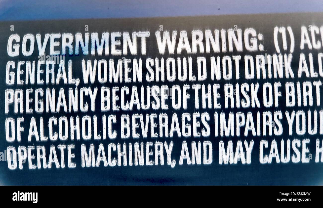 Warning Label on Beer Can Warning against Alcohol during Pregnancy Stock Photo