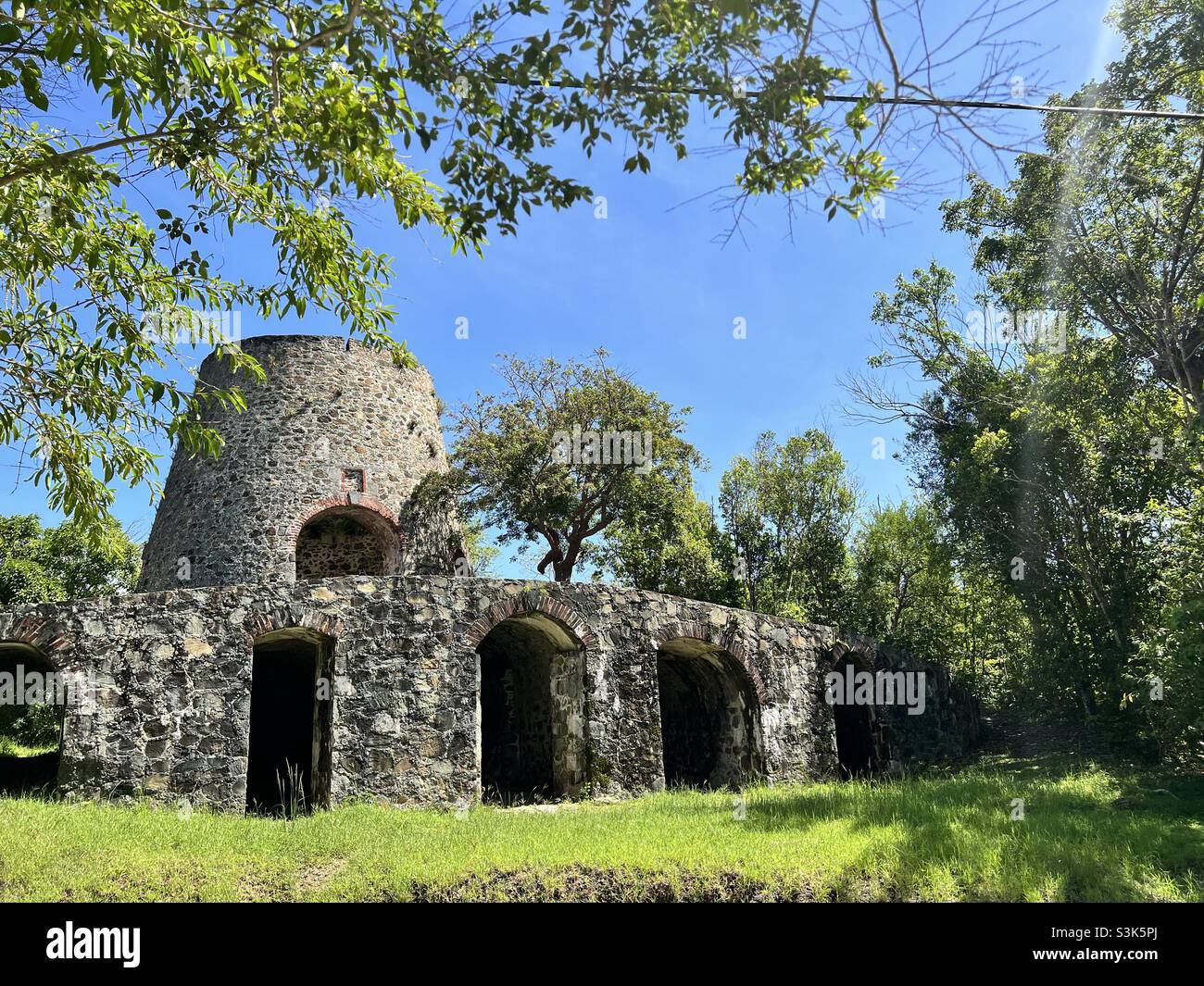 Windmill ruins on sugar cane plantation St John USVI Stock Photo