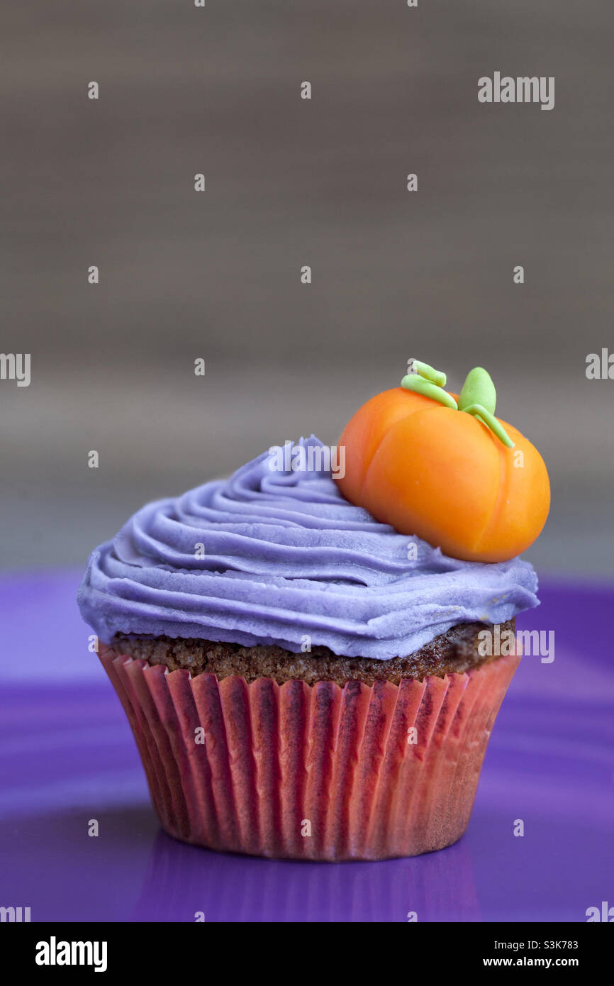 Halloween pumpkin cupcake Stock Photo