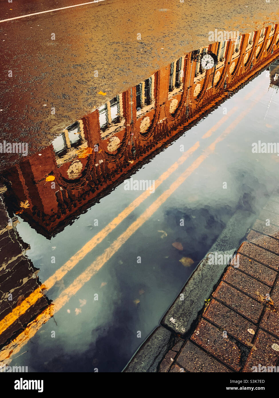 Bristol Tobacco Factory reflecting in a puddle of water - Smartphone Captured Stock Image