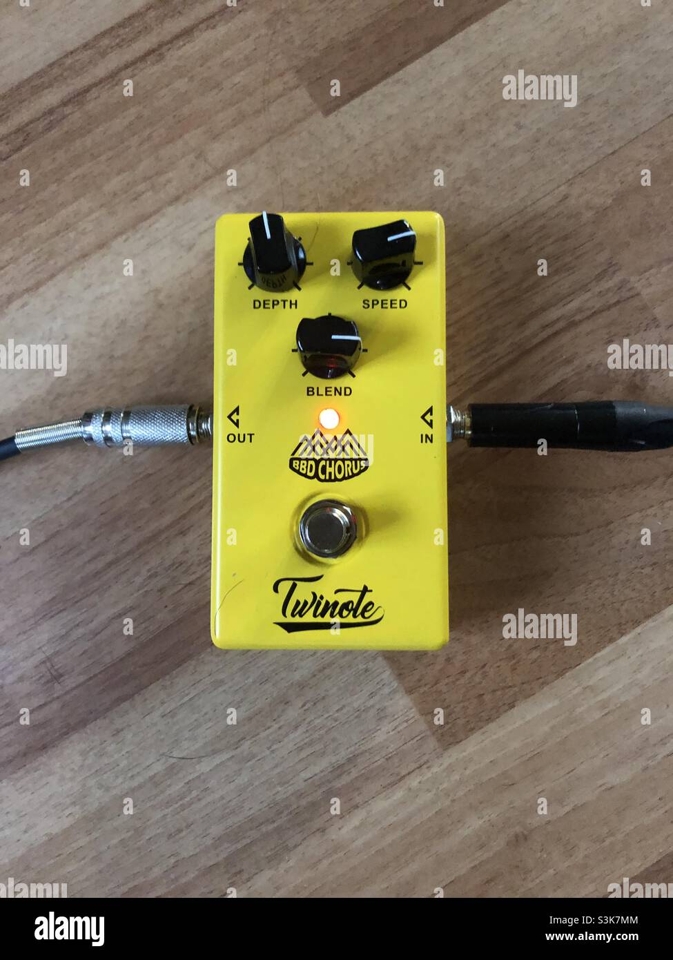 Guitar chorus pedal plugged in and on Stock Photo Alamy