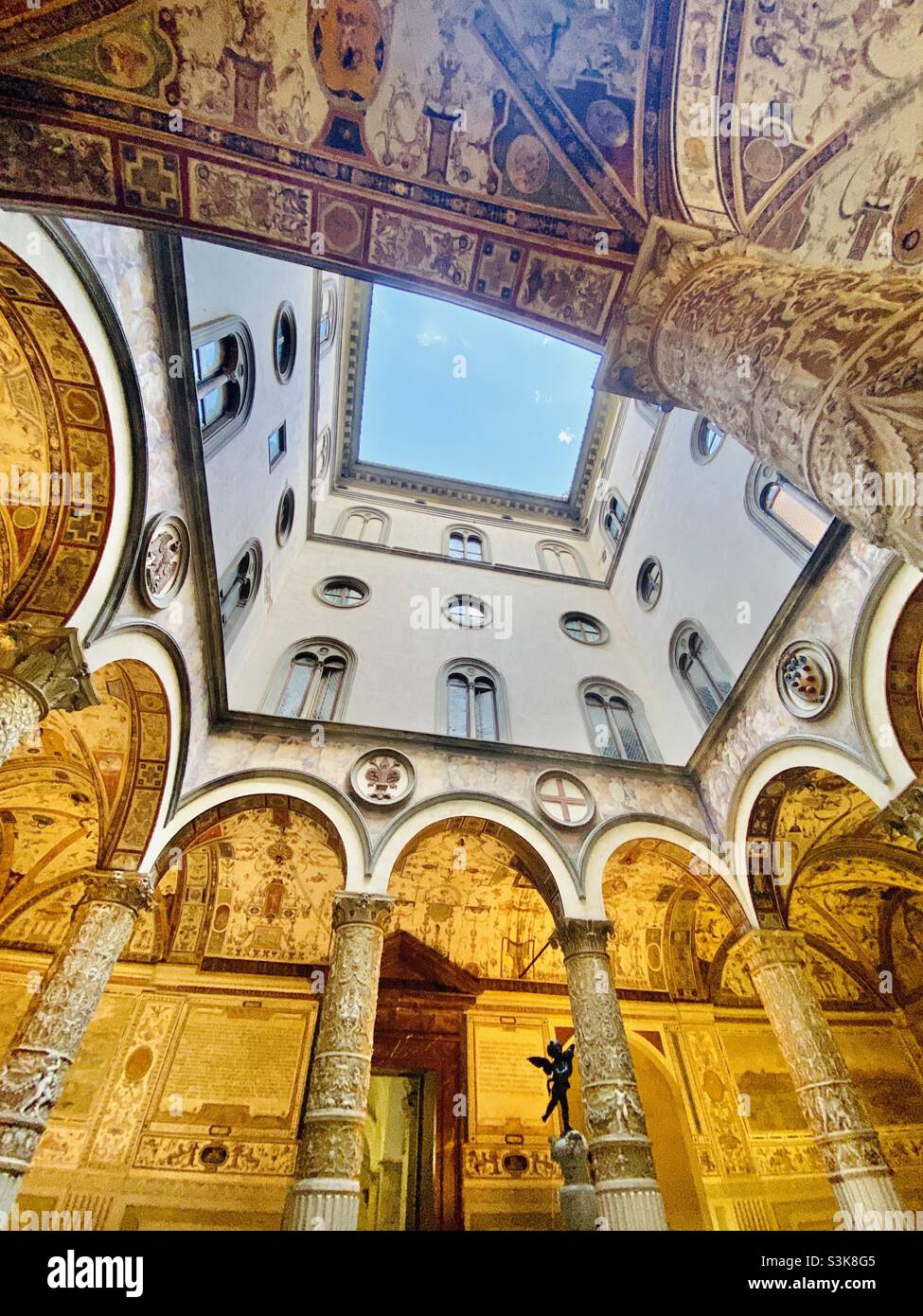 The first/entry courtyard of the Palazzo Vecchio in Florence, Italy. A symbol of the renaissance city, the Palazzo was at one time the seat of the Florentine government, and currently home to a museum - Smartphone Captured Stock Image