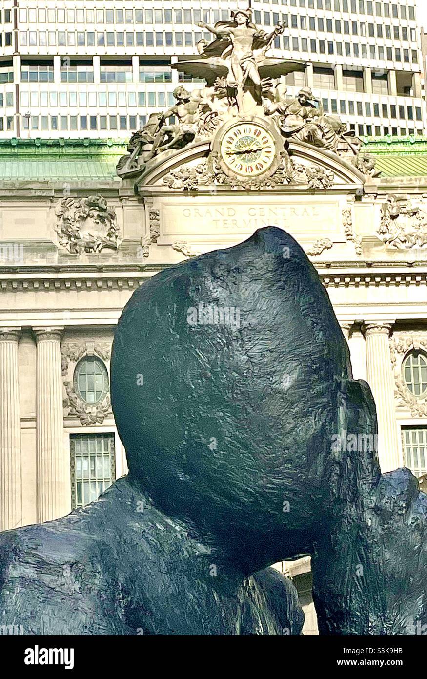 Close up of statue named listen in front of the clock at Grand Central Station, New York City - Smartphone Captured Stock Image