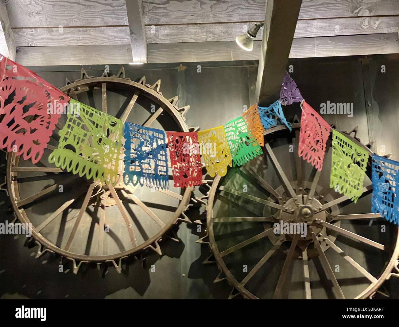 Rustic and festive decor at the entrance to a restaurant dining area, during “WitchFest”, a Fall Festival held each October at Gardner Village in the Salt Lake valley, Utah, USA. - Smartphone Captured Stock Image
