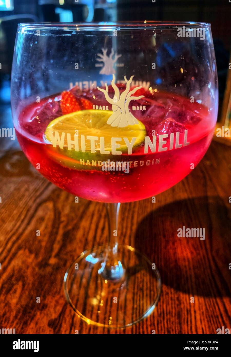 Flavoured gin and tonic in a Whitley Neill glass Stock Photo