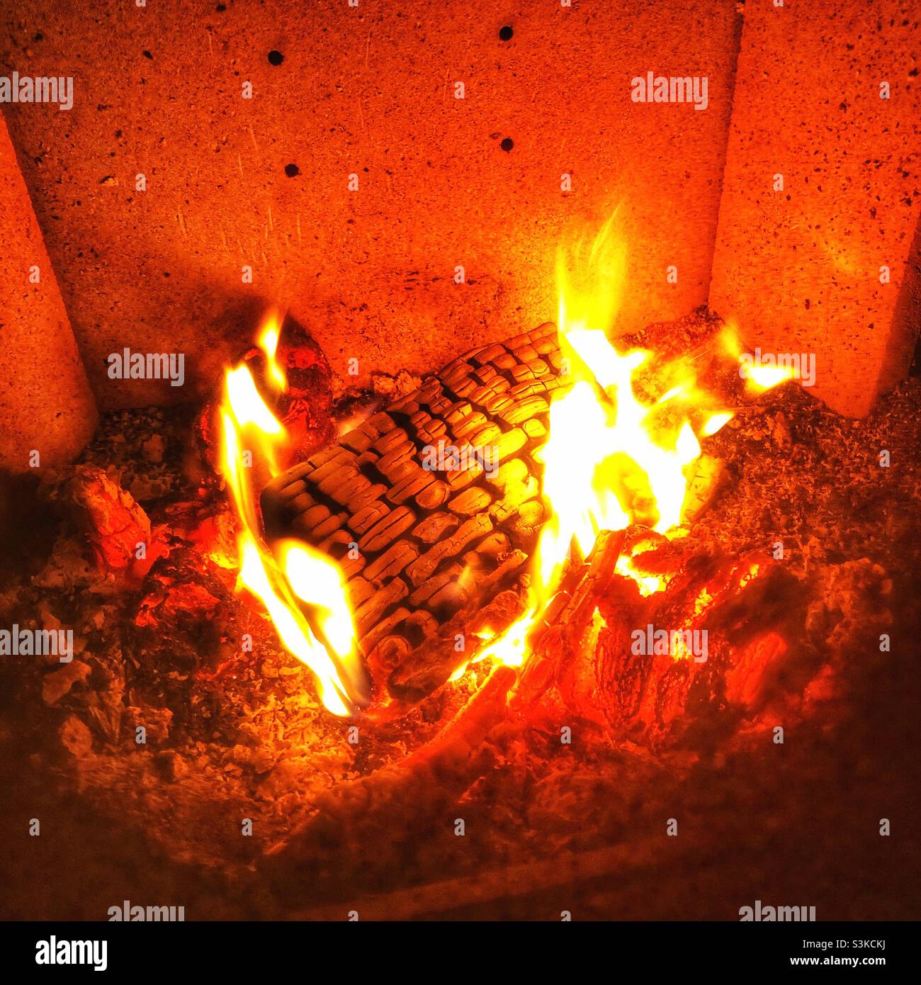 Put another log on the fire Stock Photo