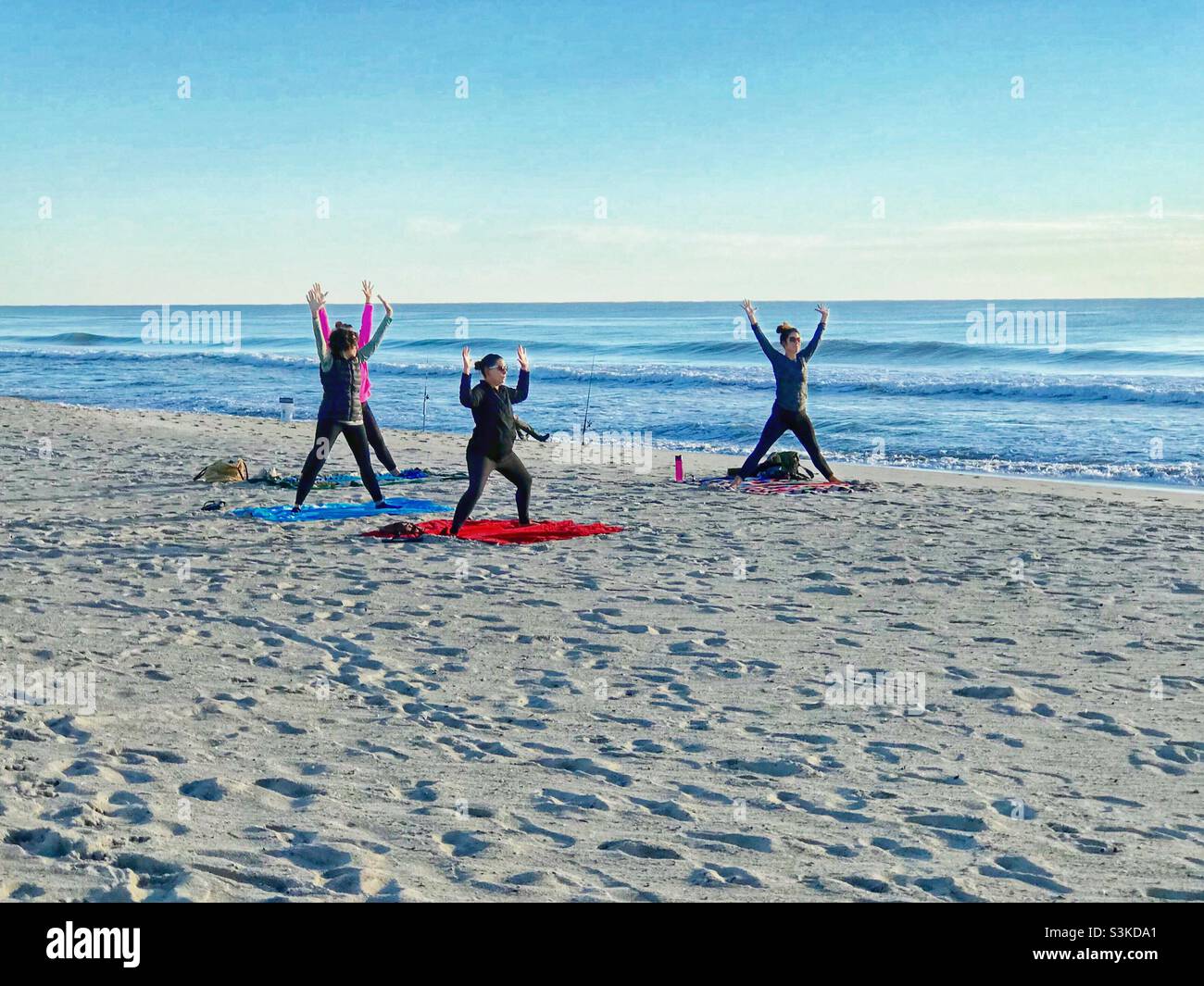 Yoga on the beach in November - Smartphone Captured Stock Image