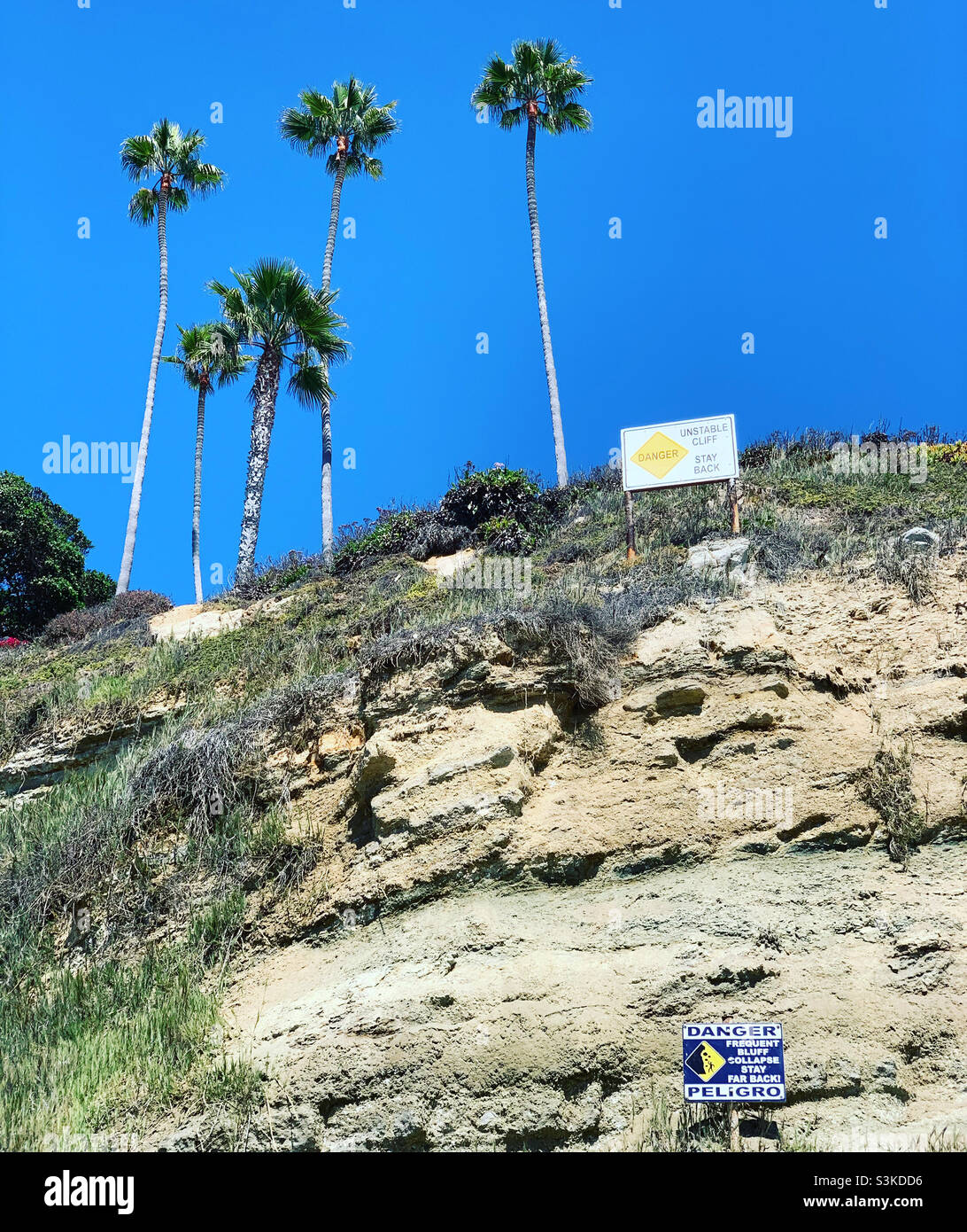 September, 2021, Danger signs on cliffs, Swami’s Beach, Encinitas, San Diego County, California, United States, North America - Smartphone Captured Stock Image
