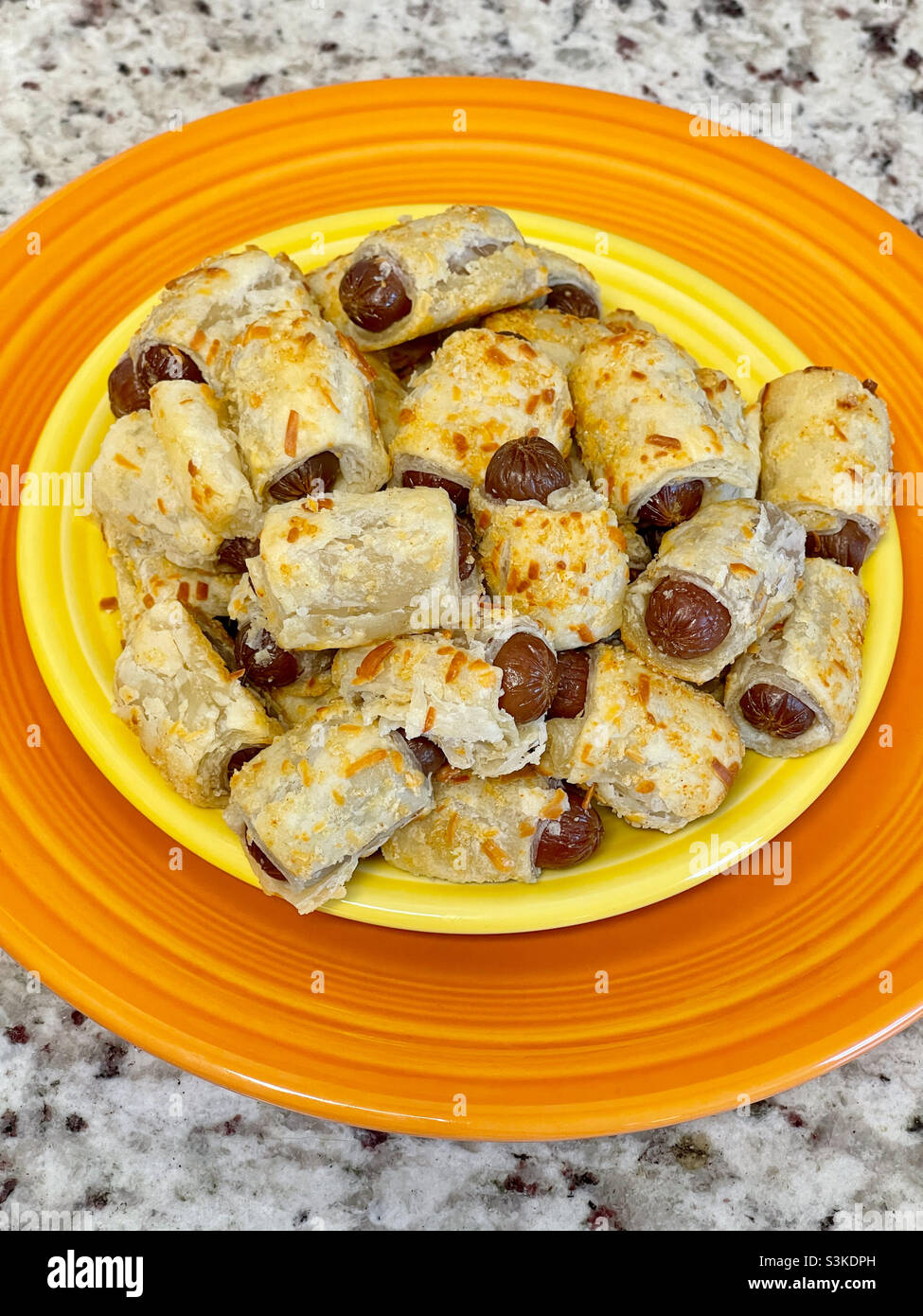 Hot out of the oven mini pigs in a blanket. The chicken and pork franks