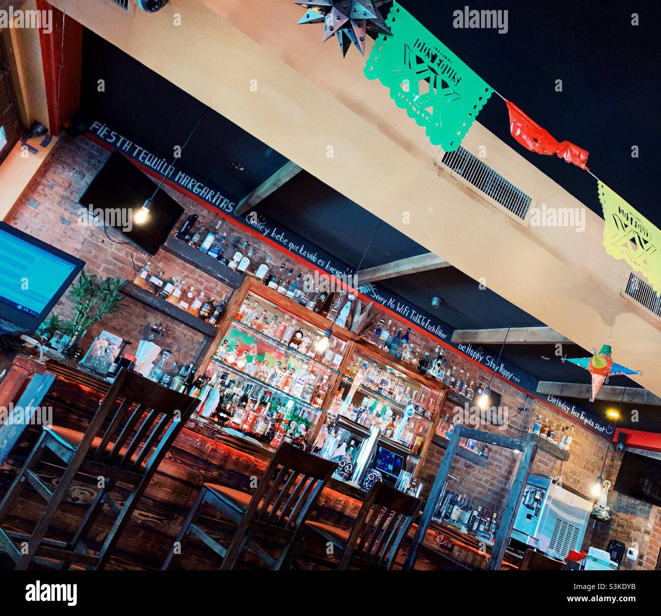 Wines display in a restaurant and bar. - Smartphone Captured Stock Image