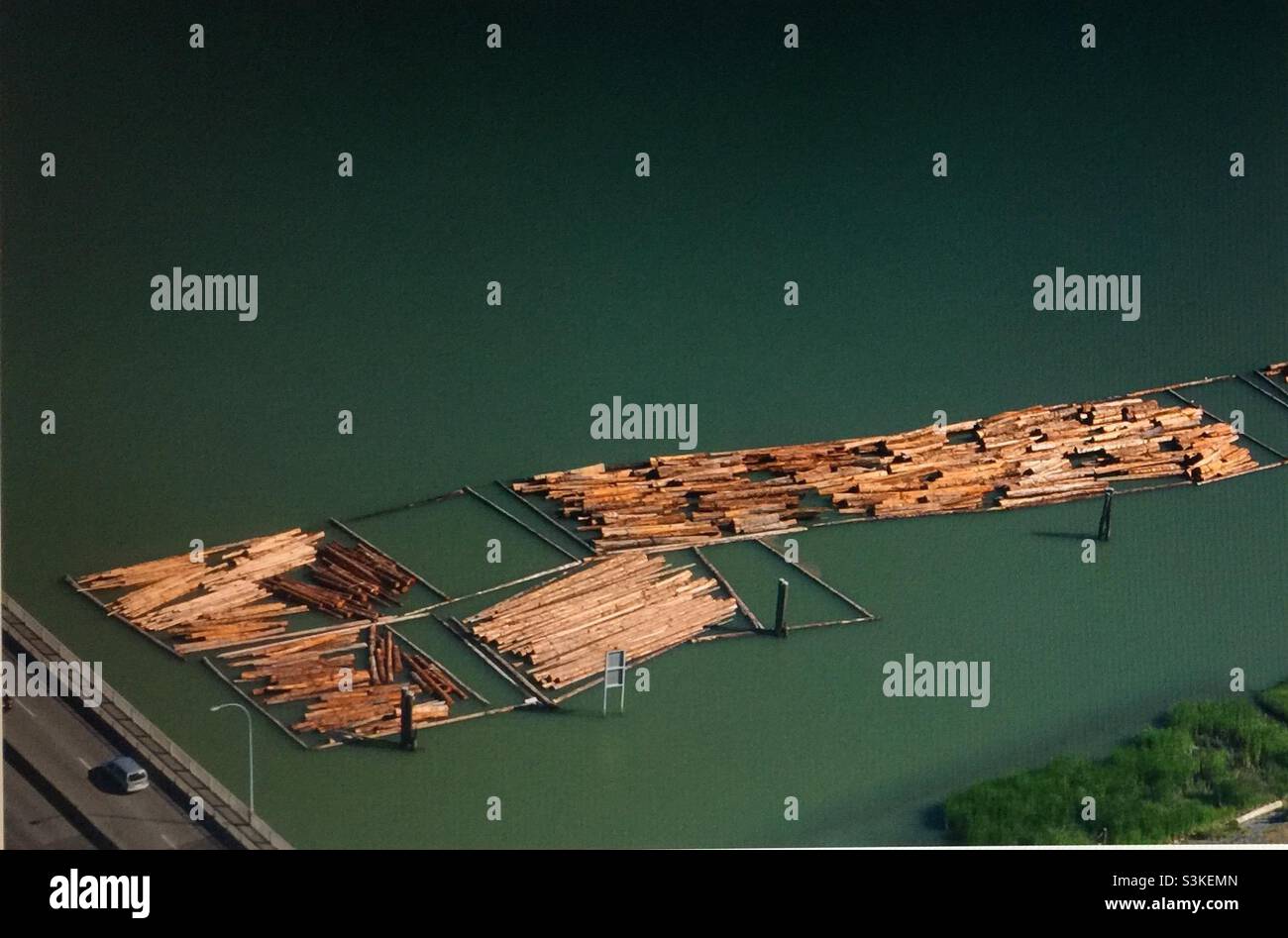 Vancouver, British Columbia, logging industry, Fraser River,  aero photography, Timber rafting, transporting felled tree trunks - Smartphone Captured Stock Image