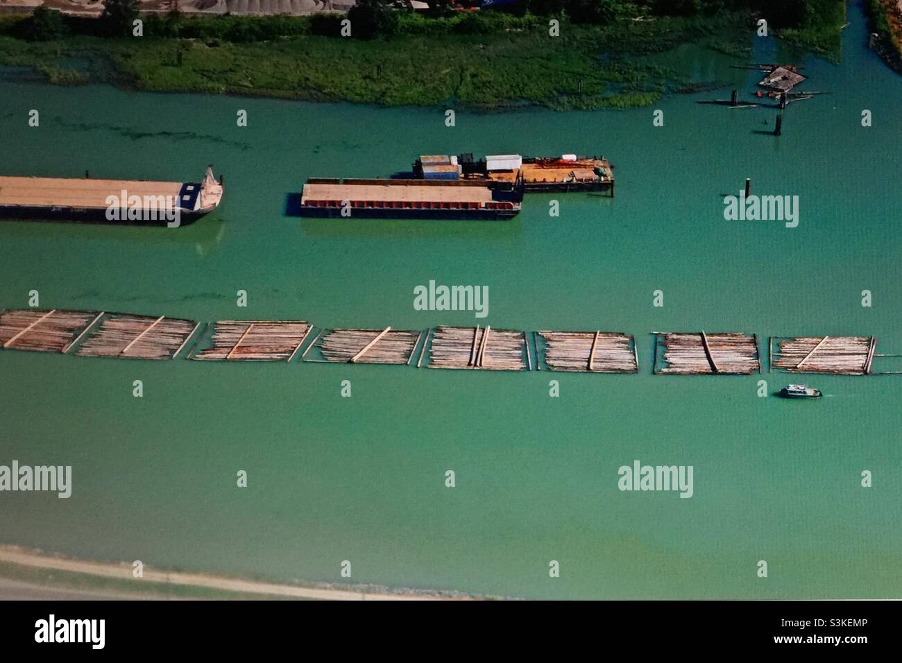 Vancouver, British Columbia, logging industry, Fraser River,  aero photography, Timber rafting, transporting felled tree trunks - Smartphone Captured Stock Image