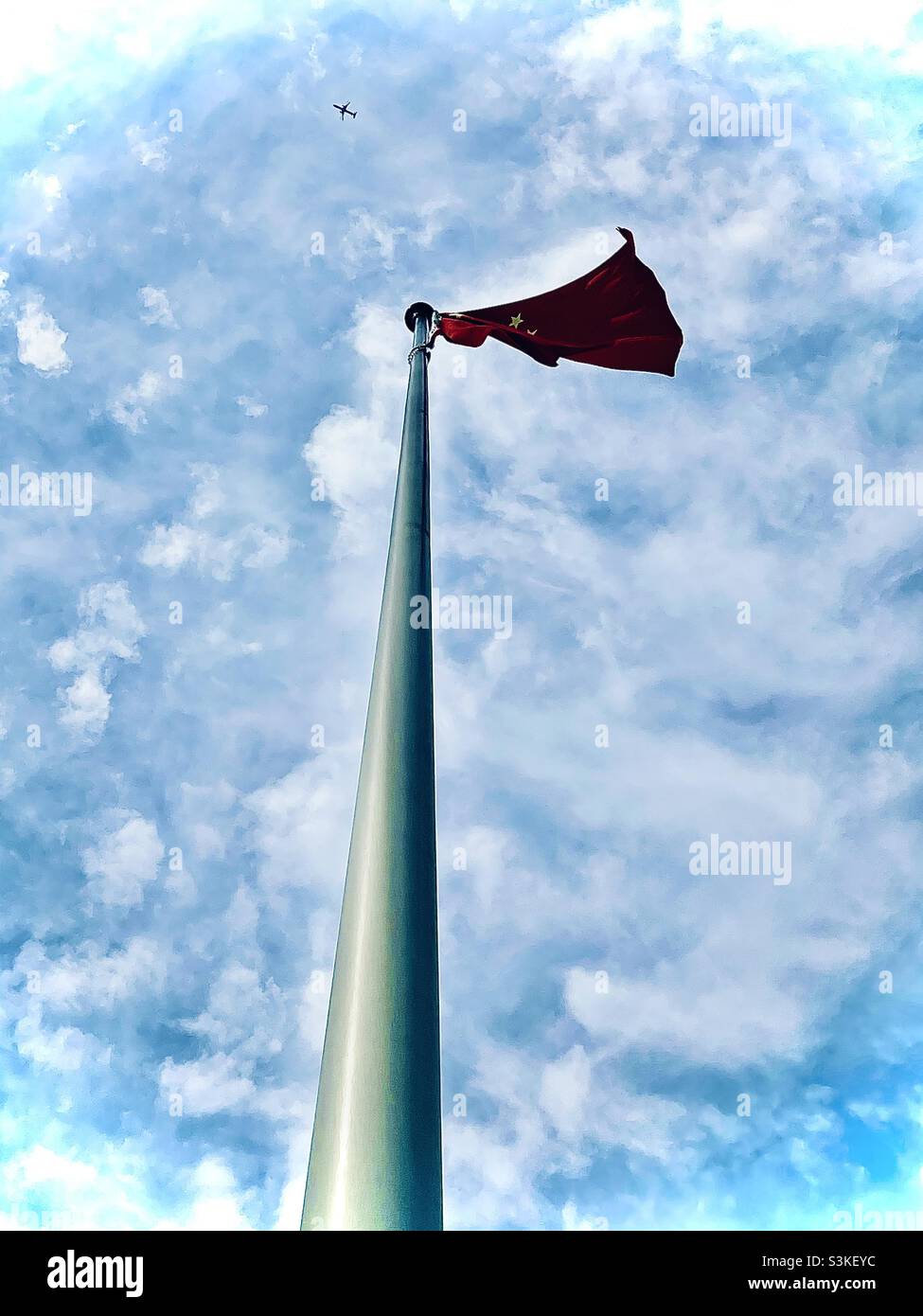 Planes in the Sky, Flags Flying High Stock Photo