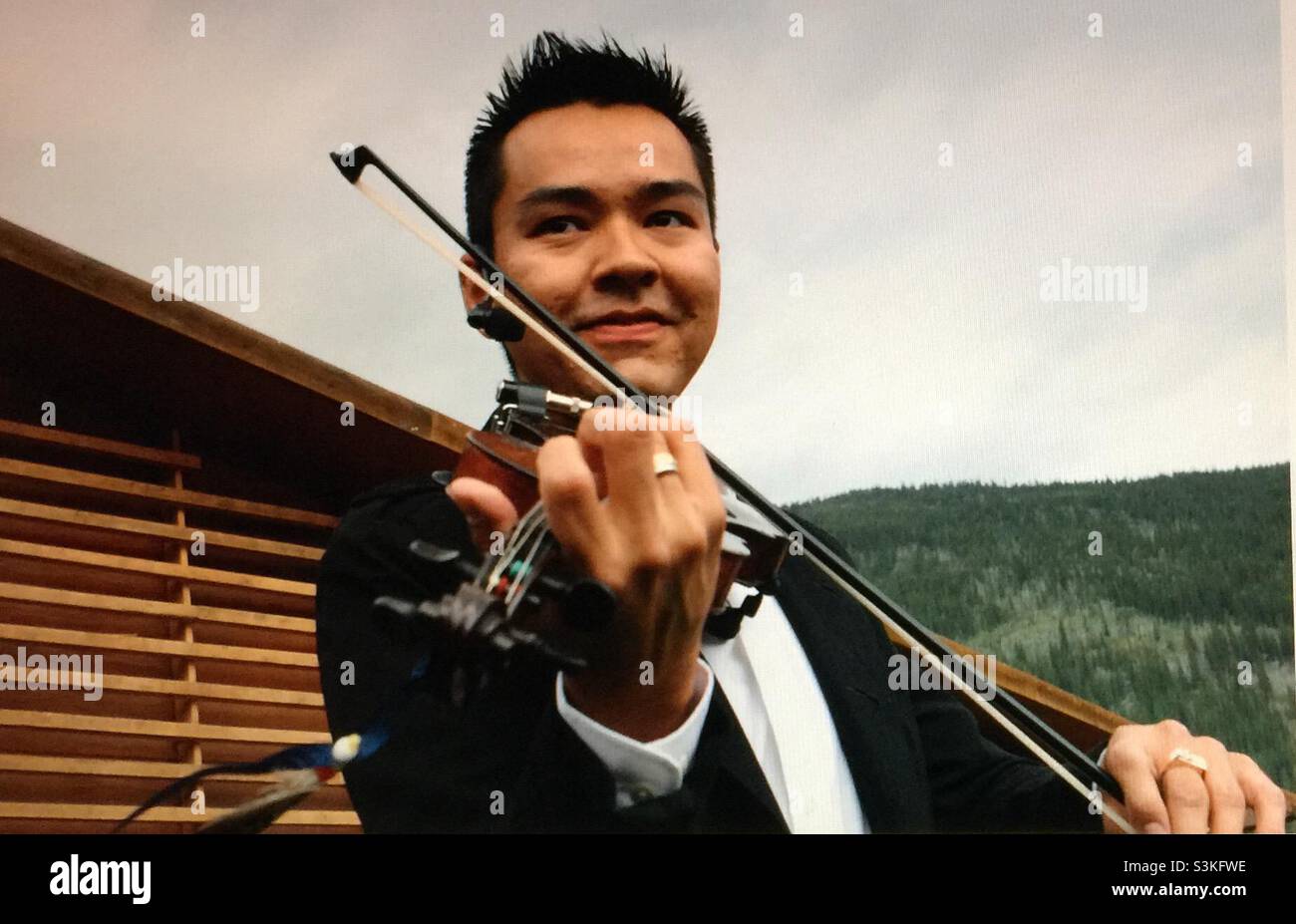 Left handed fiddle player - Smartphone Captured Stock Image