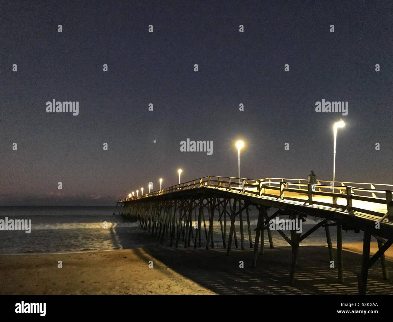 Fishing pier at night, Kure Beach - Smartphone Captured Stock Image
