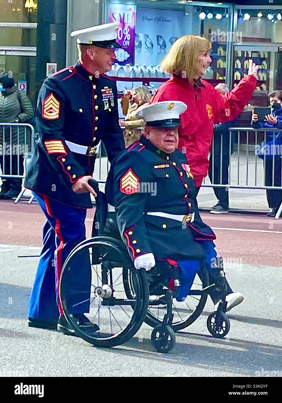 Honoring a disabled marine veteran in the Veterans Day parade New York City - Smartphone Captured Stock Image