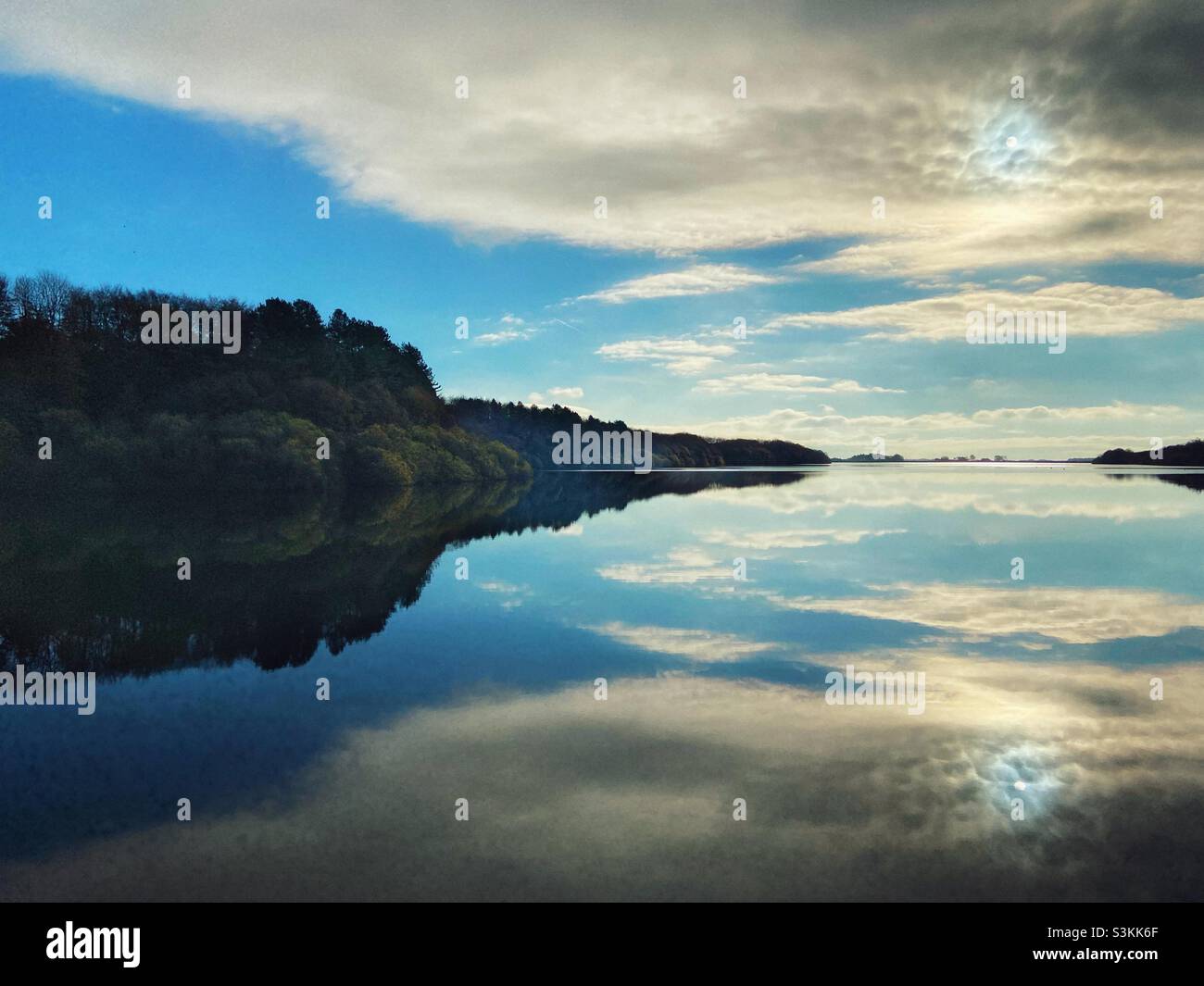 Mirror image reflection at Rivington reservoir in Lancashire Stock Photo