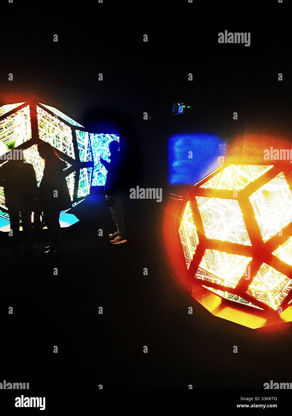 Visitors to the interactive Lightfield Art Exhibition, Marble Arch