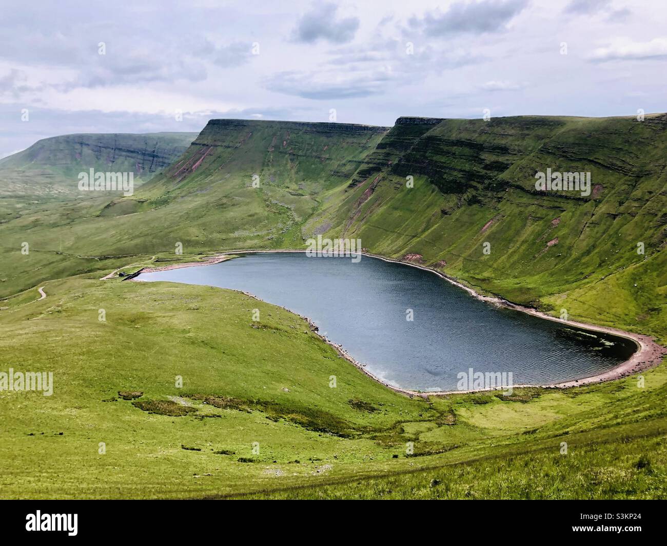 A view of a lake up high on the Brecon Beacons in Wales - Smartphone Captured Stock Image