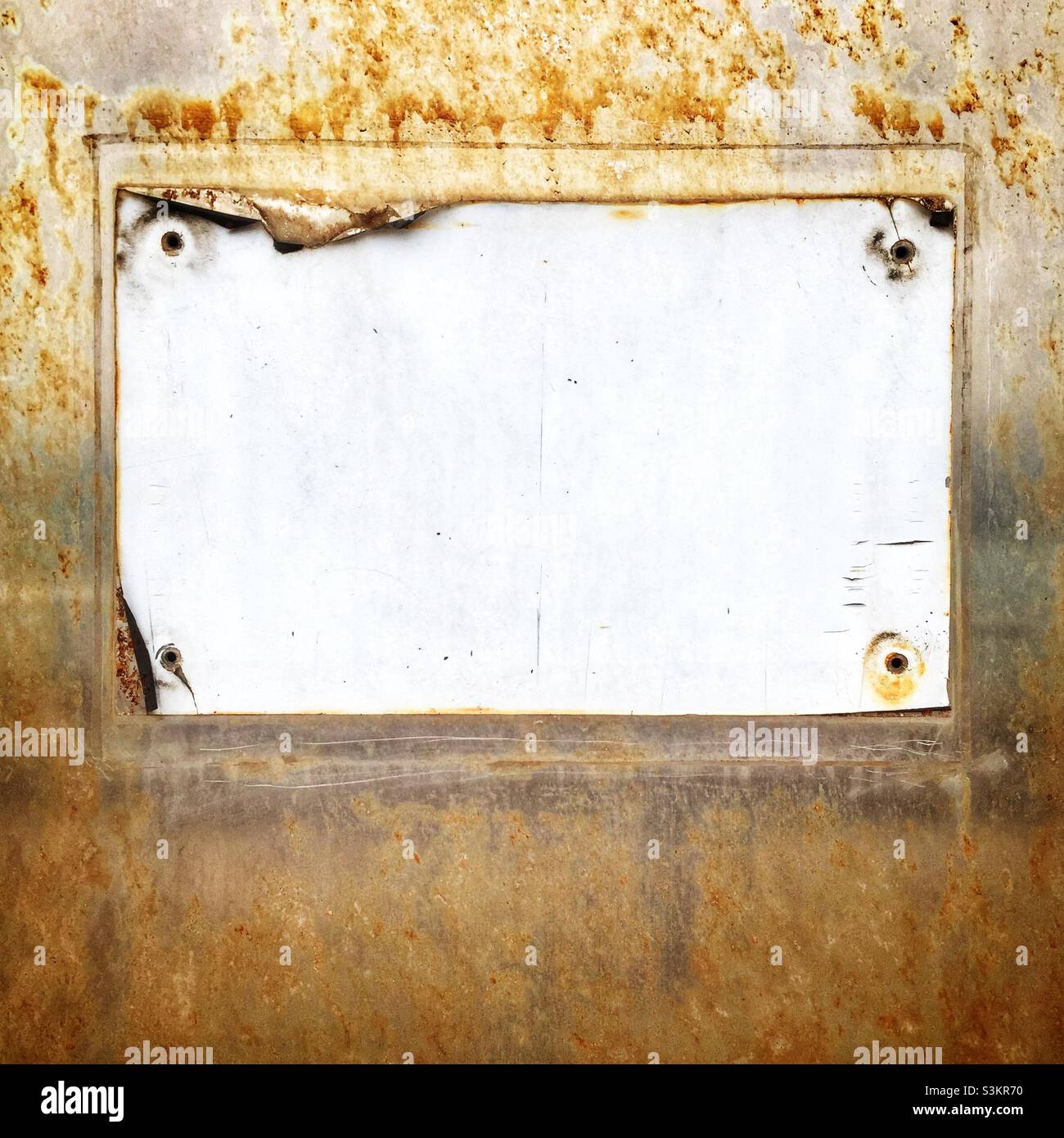 Detail of a faded and peeling sign on a rusting metal door, Hong Kong - Smartphone Captured Stock Image