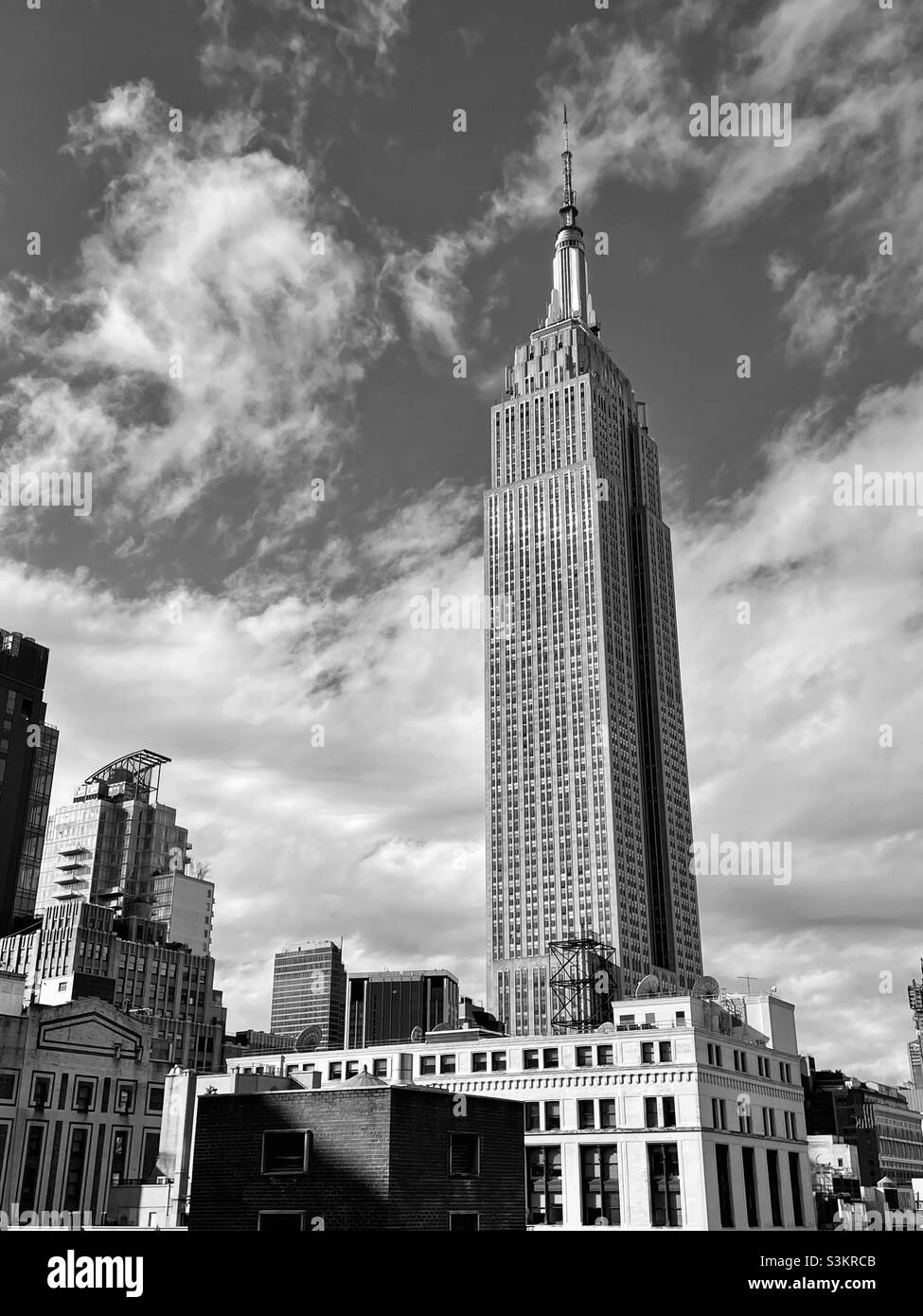 Black and white photo of the iconic Empire State building in New York City - Smartphone Captured Stock Image