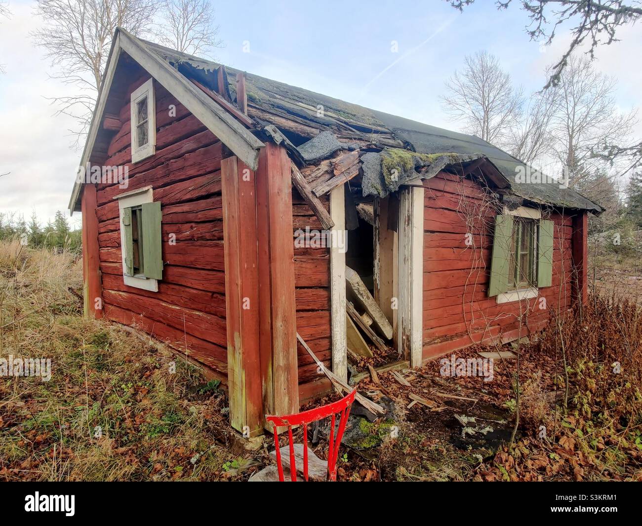 Wooden ruins, Åby, Östergötland region, wooden house, Falun red color, Sweden Stock Photo