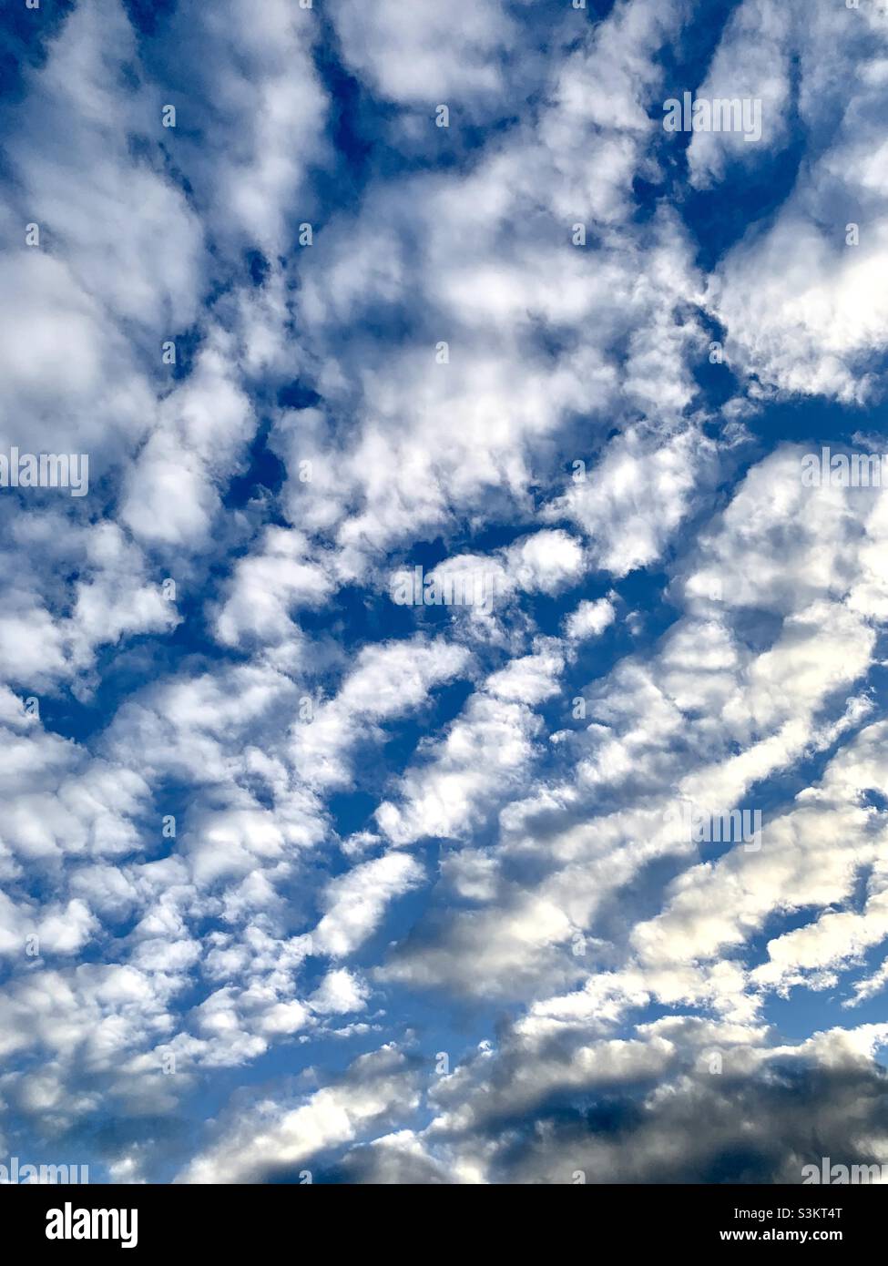 Dramatic rippled clouds in the sky Stock Photo