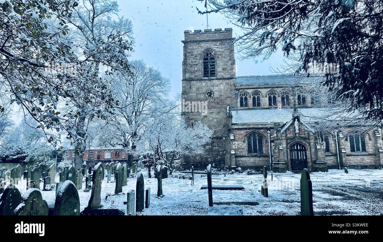 Church & Graveyard in the snow - Christmas card Stock Photo
