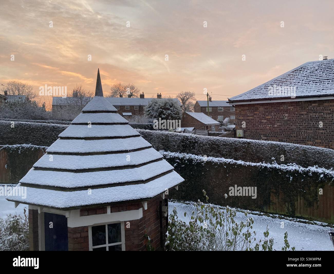 Winter sunrise over village houses - Smartphone Captured Stock Image