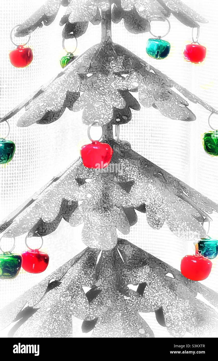 A small metallic Christmas tree with red and green ornaments. - Smartphone Captured Stock Image