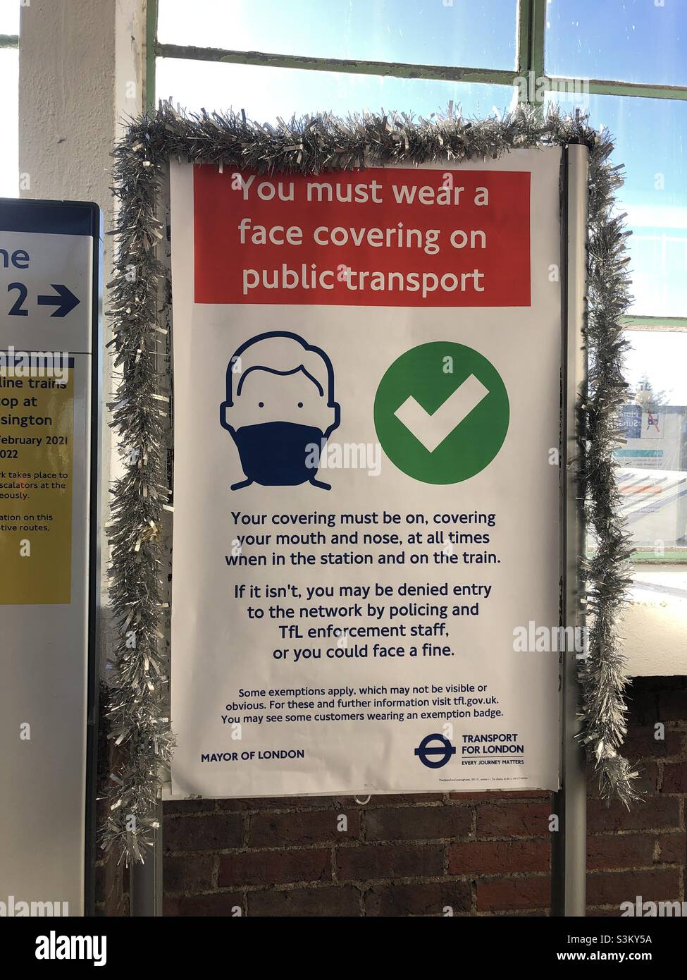 2nd December London updated covid measure introduced in public transport in England in efforts to prevent needle found omicron variant of covid 19. Passengers are requested to wear face covering Stock Photo